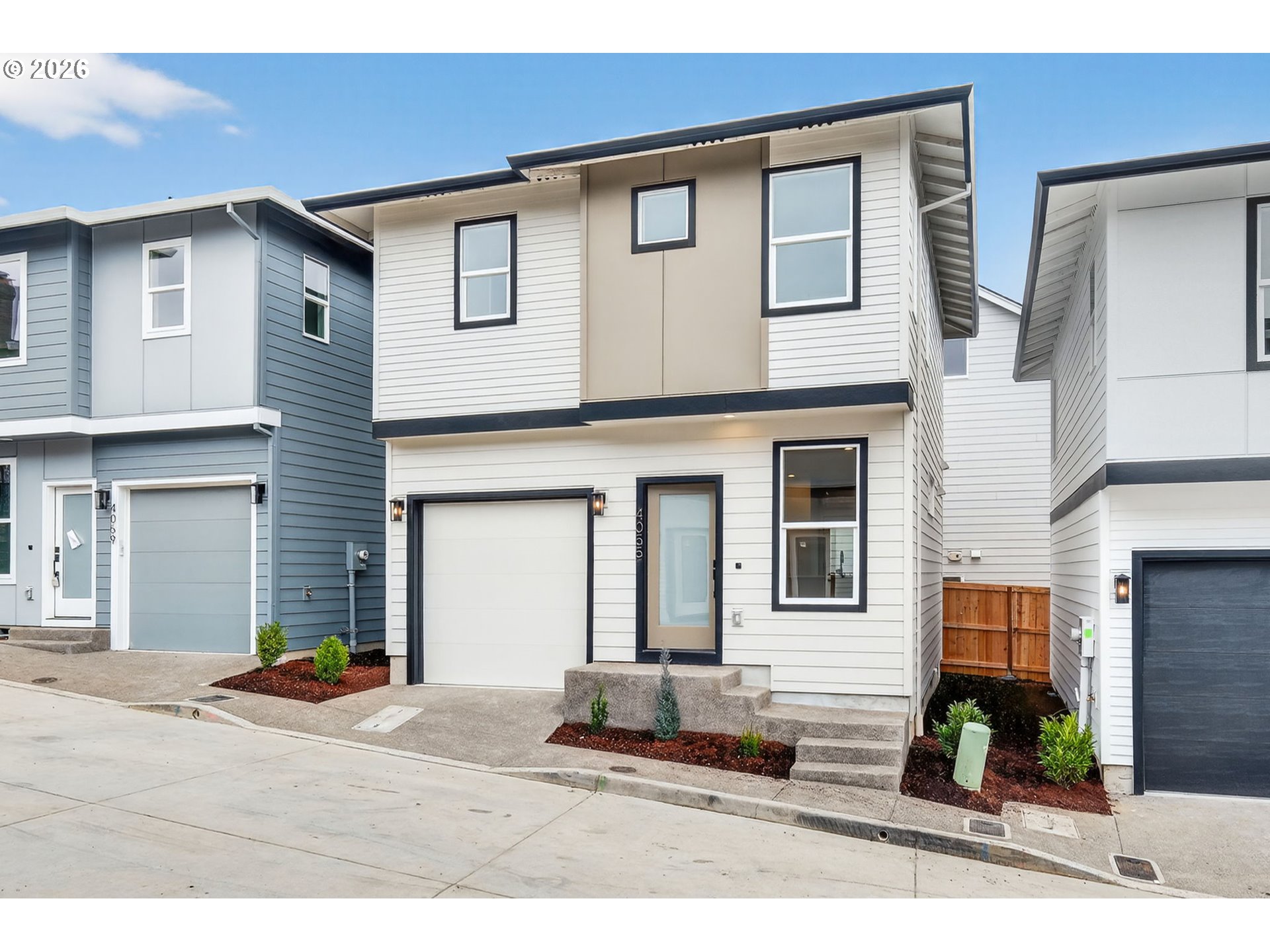 4055 Southwest McKinley Street, Unit 39 Gresham, OR 97080 - Photo 30 of 35 a house view with a outdoor space