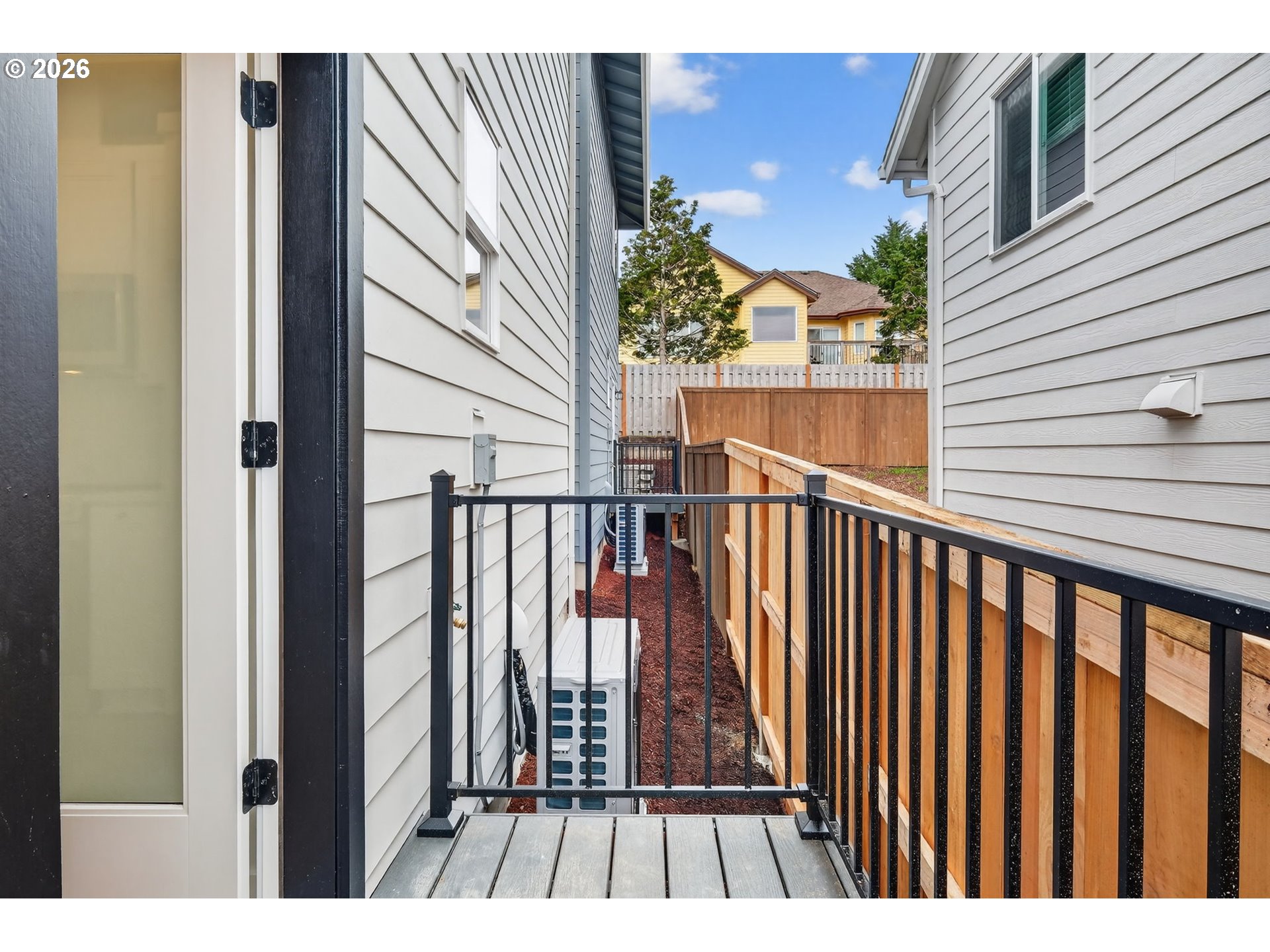 4055 Southwest McKinley Street, Unit 39 Gresham, OR 97080 - Photo 31 of 35 a view of balcony with wooden floor