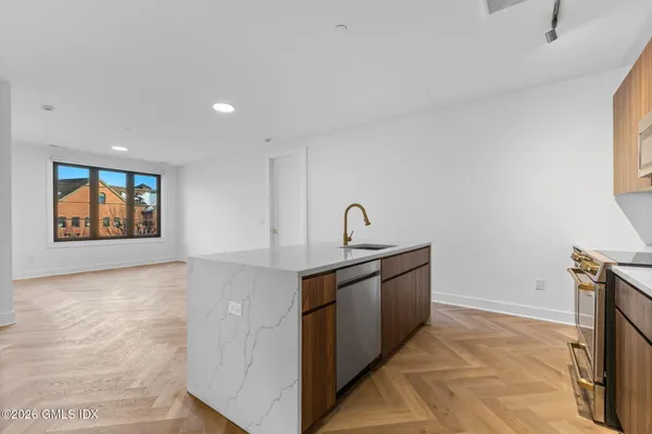 a view of a kitchen with a sink