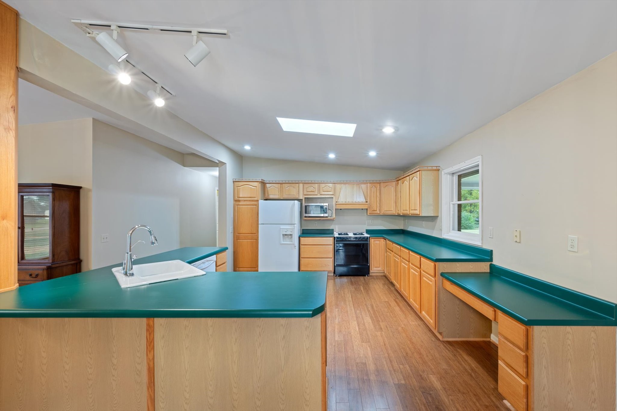 106 Lee Drive Springfield, TN 37172 - Photo 11 of 25 a large kitchen with kitchen island a large counter top space and stainless steel appliances