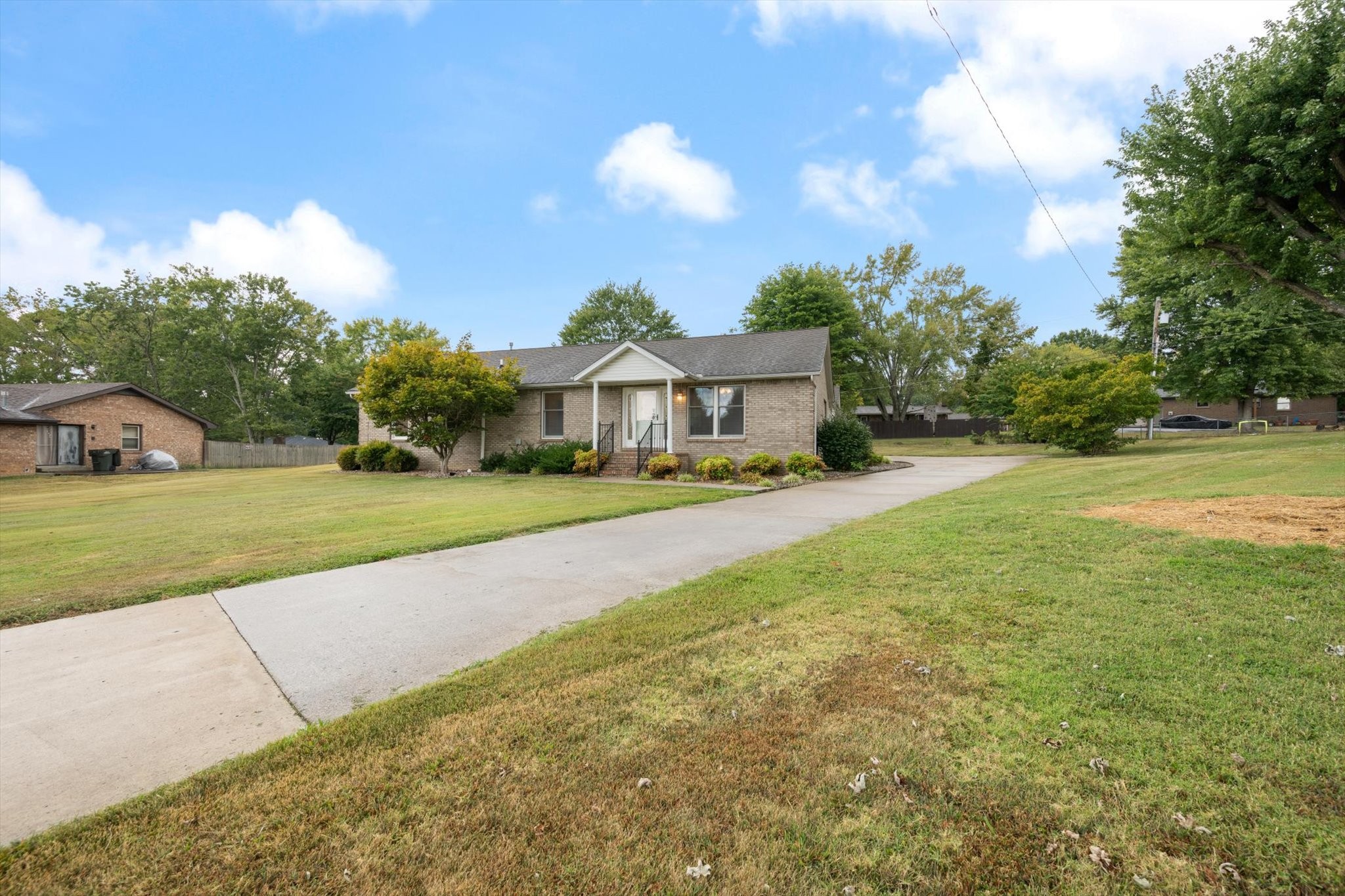 106 Lee Drive Springfield, TN 37172 - Photo 2 of 25 a view of house with garden space and trees