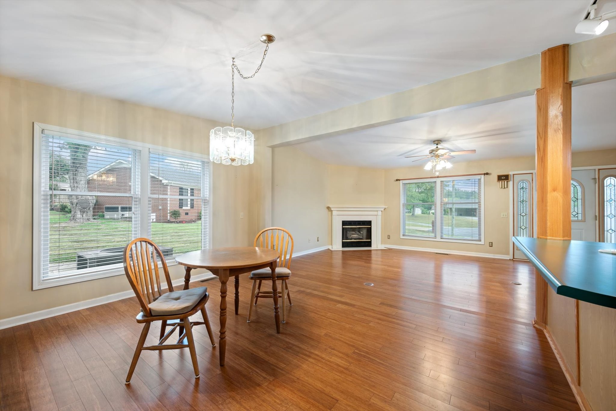106 Lee Drive Springfield, TN 37172 - Photo 9 of 25 a dining room with furniture a chandelier and wooden floor