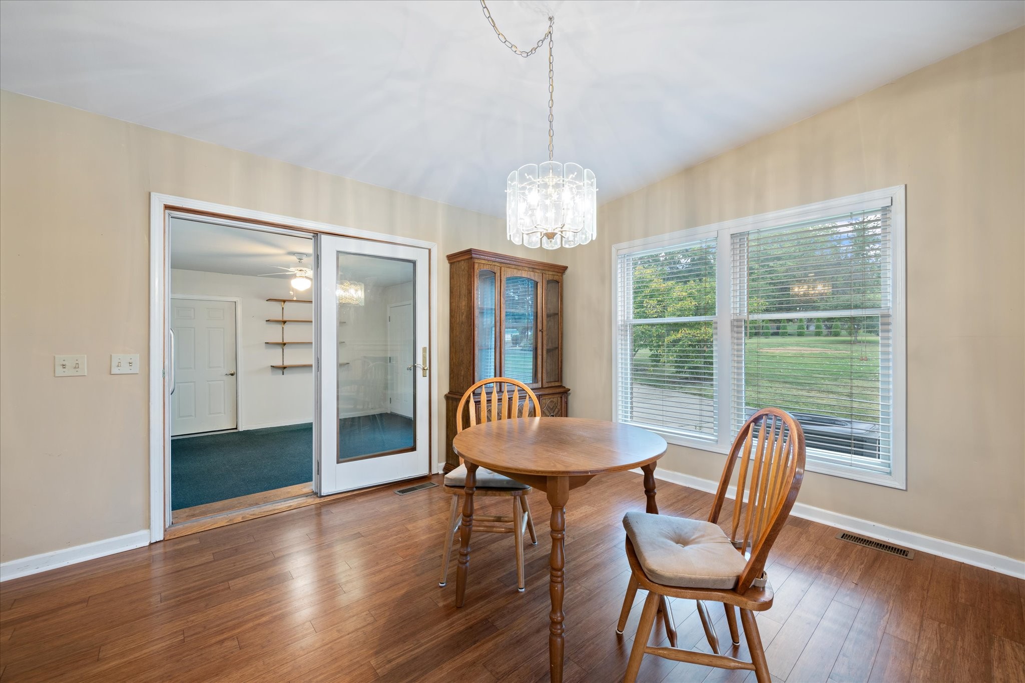 106 Lee Drive Springfield, TN 37172 - Photo 10 of 25 a view of a dining room with furniture wooden floor and chandelier