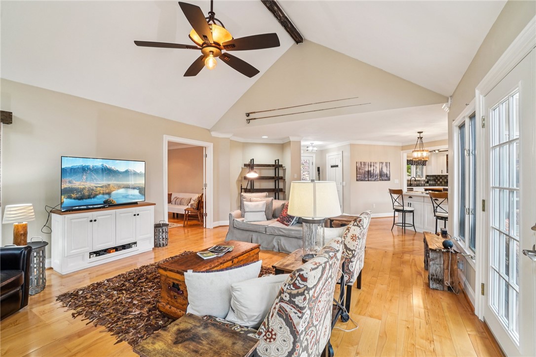 120 Beacon Ridge Circle Salem, SC 29676 - Photo 15 of 48 This inviting interior boasts vaulted ceilings and bright hardwood floors, perfect for daily living and entertaining.