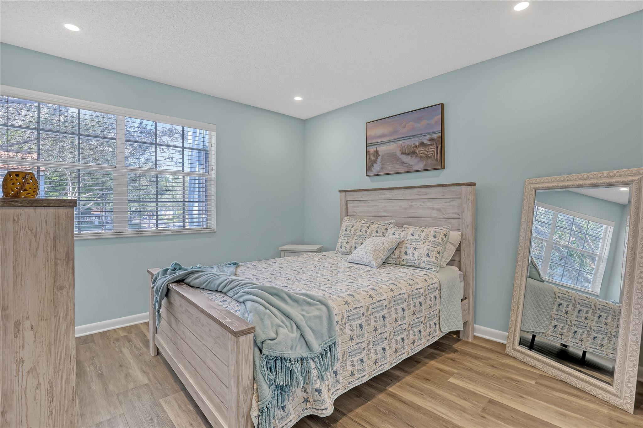 3143 Clint Moore Road, Unit 205 Boca Raton, FL 33496 - Photo 12 of 27 a bedroom with a bed and a window