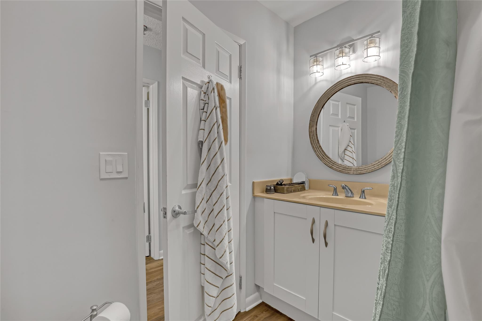 3143 Clint Moore Road, Unit 205 Boca Raton, FL 33496 - Photo 16 of 27 a view of bathroom with a sink and a mirror