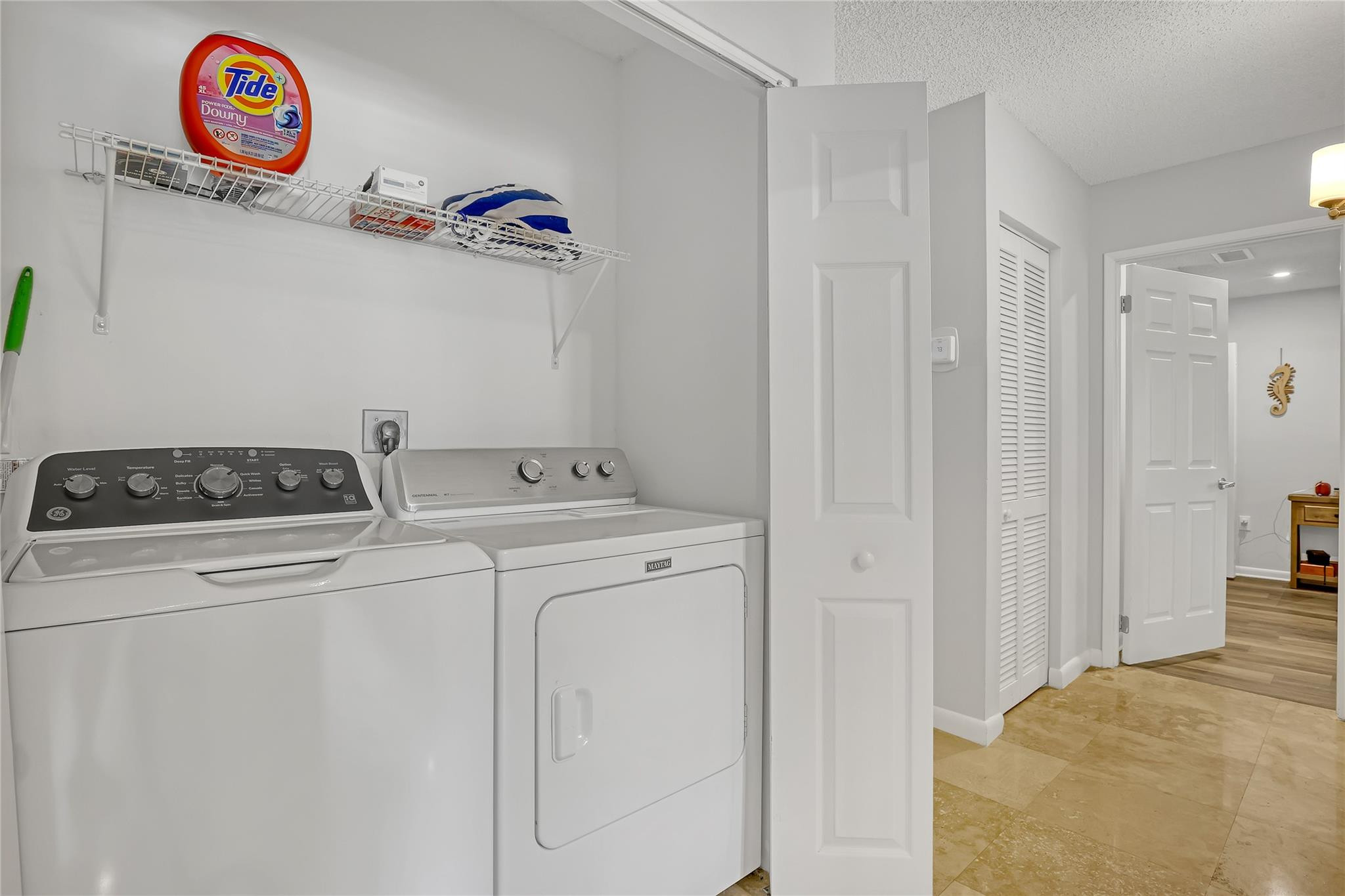 3143 Clint Moore Road, Unit 205 Boca Raton, FL 33496 - Photo 17 of 27 a utility room with dryer and washer