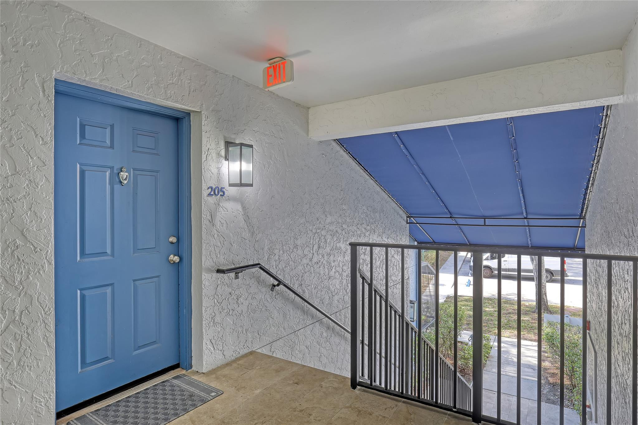 3143 Clint Moore Road, Unit 205 Boca Raton, FL 33496 - Photo 3 of 27 a view of entryway