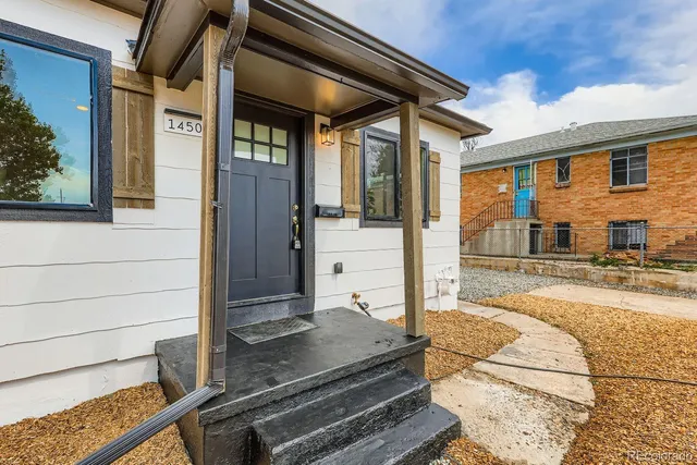 a view of a living room and a car porch