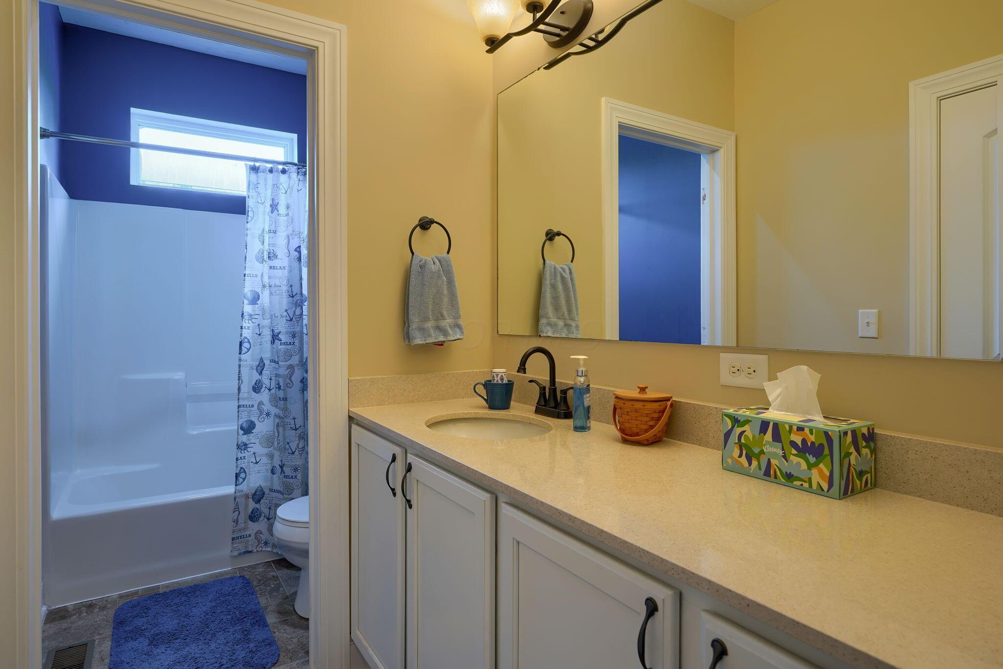 6223 Wilson Road Northwest Lancaster, OH 43130 - Photo 55 of 111 Second full bath with oversized vanity and private shower and toilet area