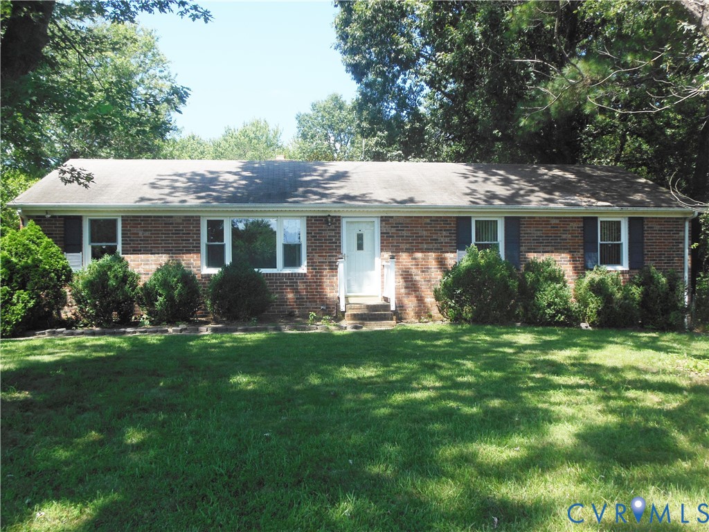 7146 Cold Harbor Road Mechanicsville, VA 23111 - Photo 1 of 26 a front view of house with yard and green space
