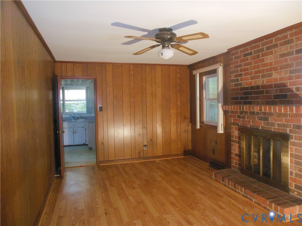 7146 Cold Harbor Road Mechanicsville, VA 23111 - Photo 14 of 26 a view of an empty room with a fireplace