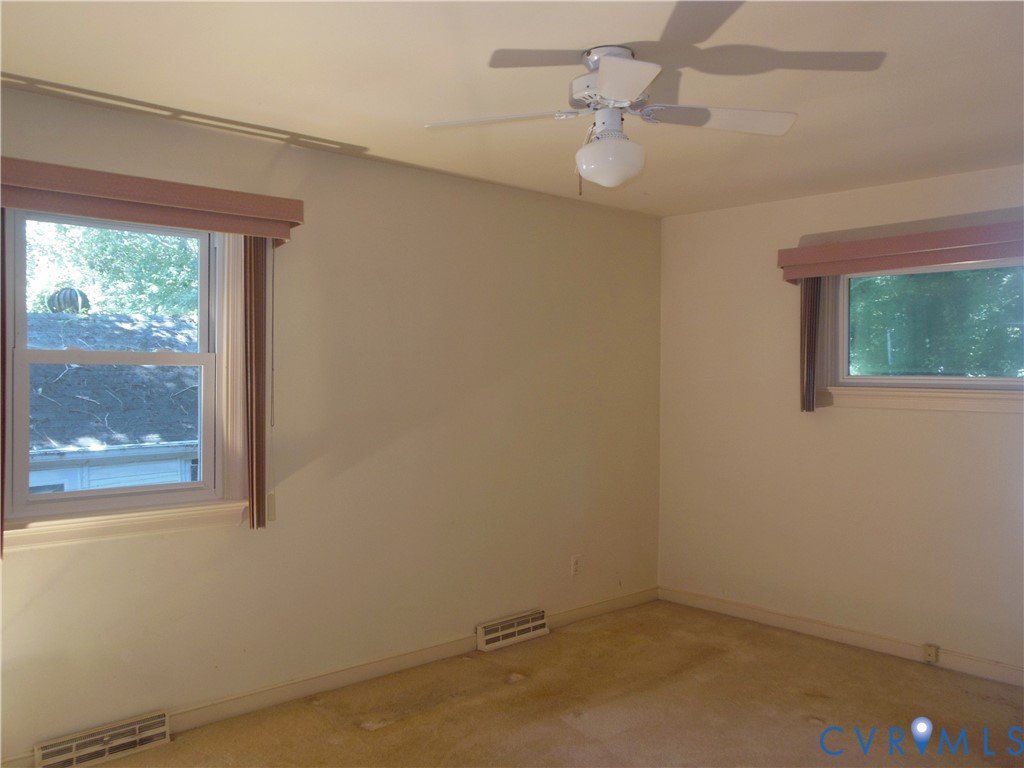 7146 Cold Harbor Road Mechanicsville, VA 23111 - Photo 16 of 26 an empty room with a window