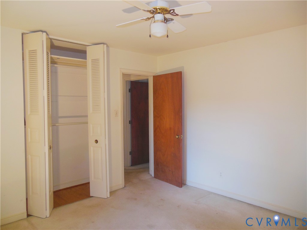 7146 Cold Harbor Road Mechanicsville, VA 23111 - Photo 21 of 26 a view of hallway with chandelier fan