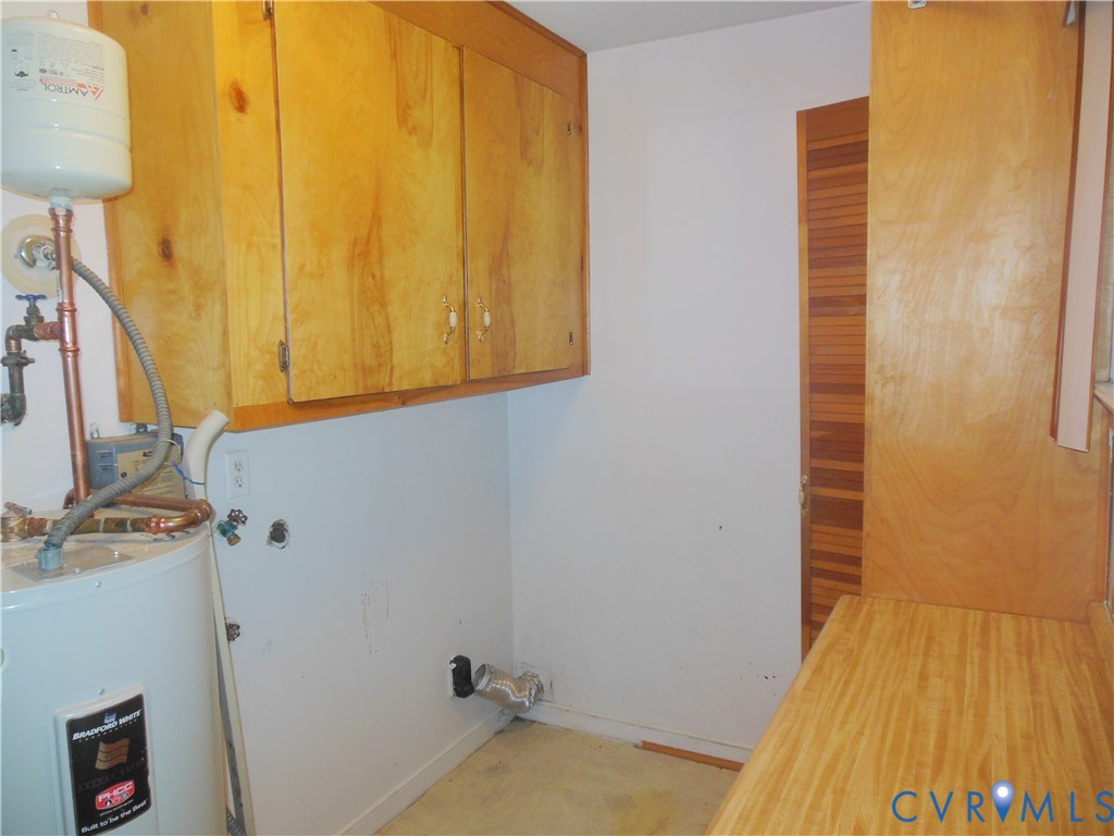 7146 Cold Harbor Road Mechanicsville, VA 23111 - Photo 26 of 26 a bathroom with a sink and a mirror