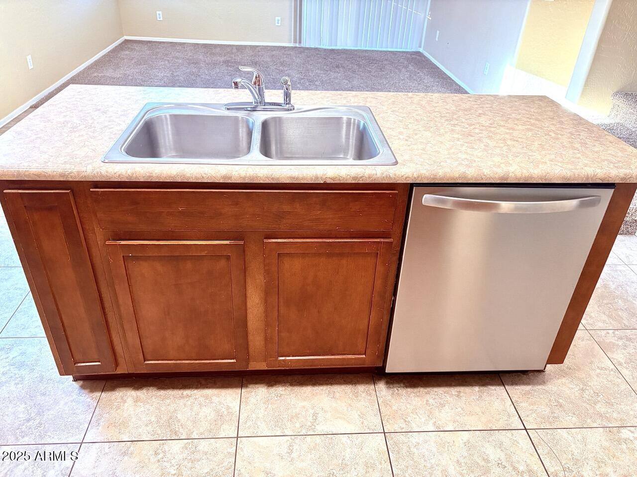 4014 East Superior Road San Tan Valley, AZ 85143 - Photo 11 of 36 a kitchen with a sink and a microwave