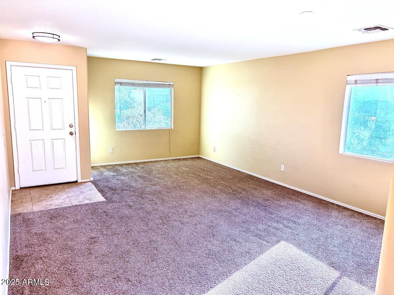 4014 East Superior Road San Tan Valley, AZ 85143 - Photo 14 of 36 a view of an empty room with a window