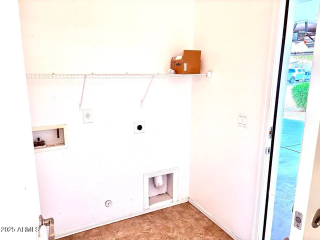 a bathroom with a shower and a sink