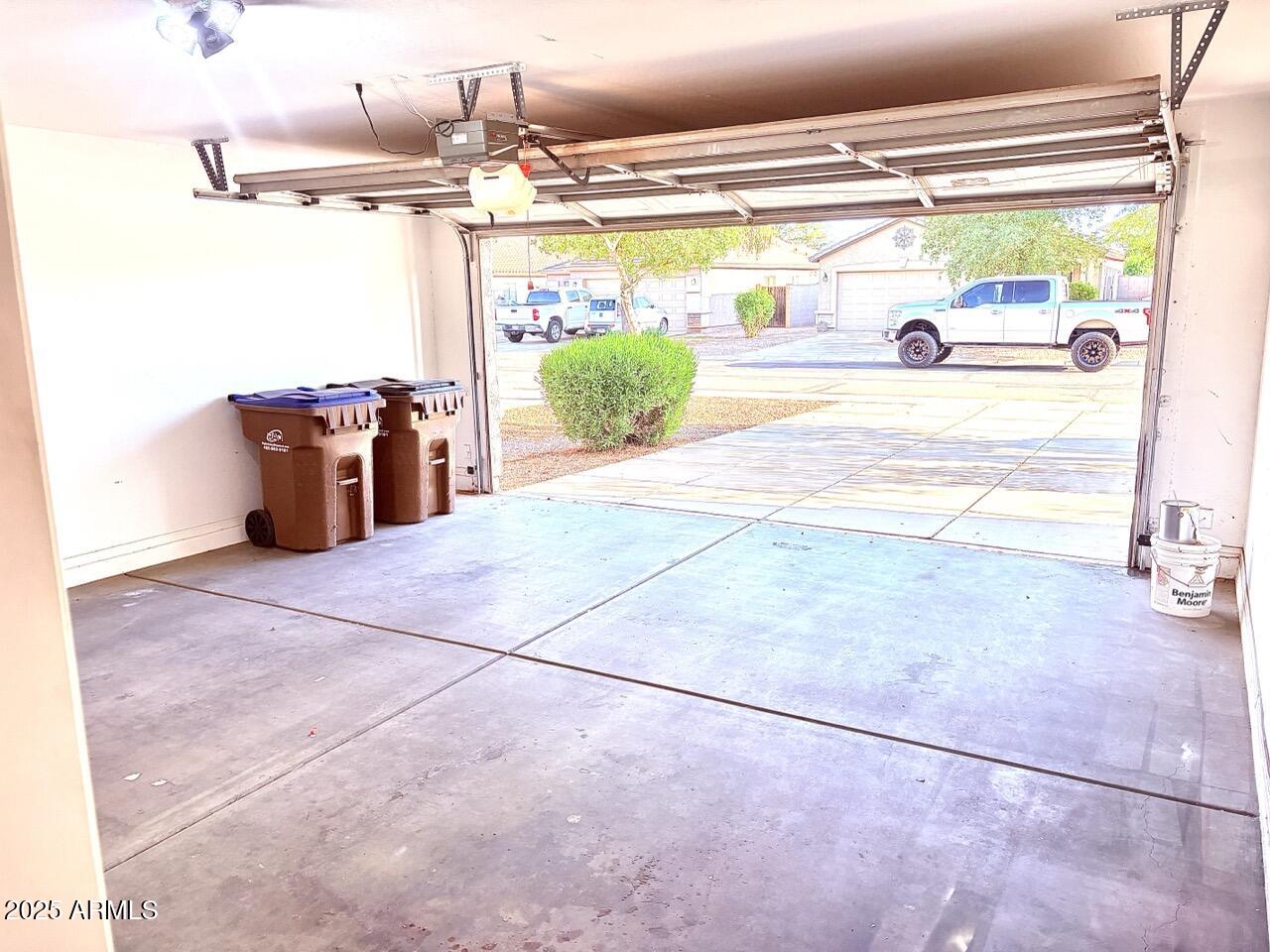4014 East Superior Road San Tan Valley, AZ 85143 - Photo 36 of 36 a picture of a room with a floor to ceiling window and potted plants