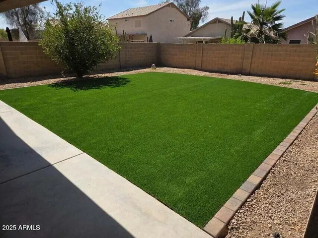 a view of a backyard with a garden
