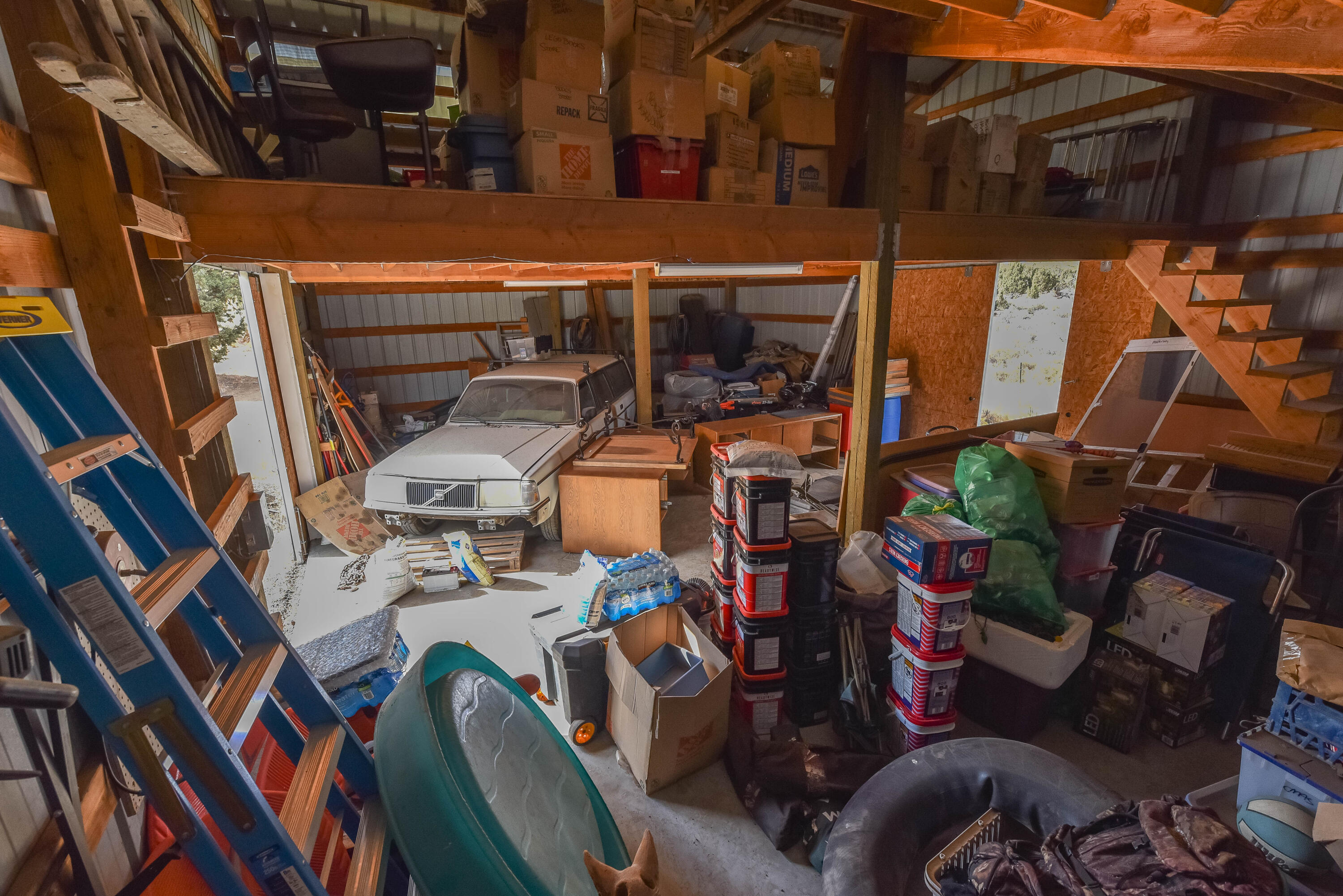 21698 Rickard Road Bend, OR 97702 - Photo 42 of 51 Inside of the barn being used for storage right now.