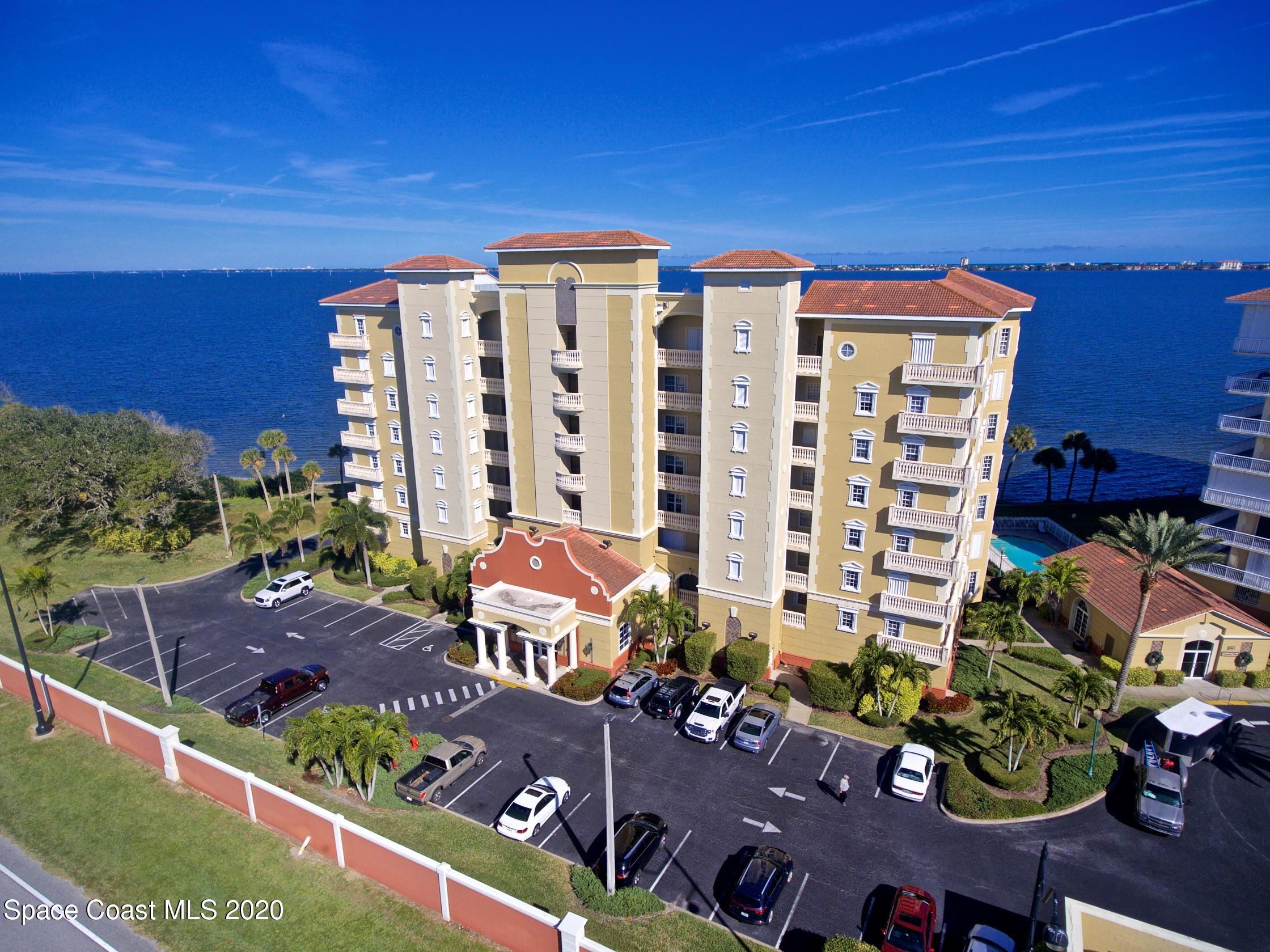4955 Dixie Highway Northeast, Unit 404 Palm Bay, FL 32905 - Photo 1 of 50 front view of a house with a yard