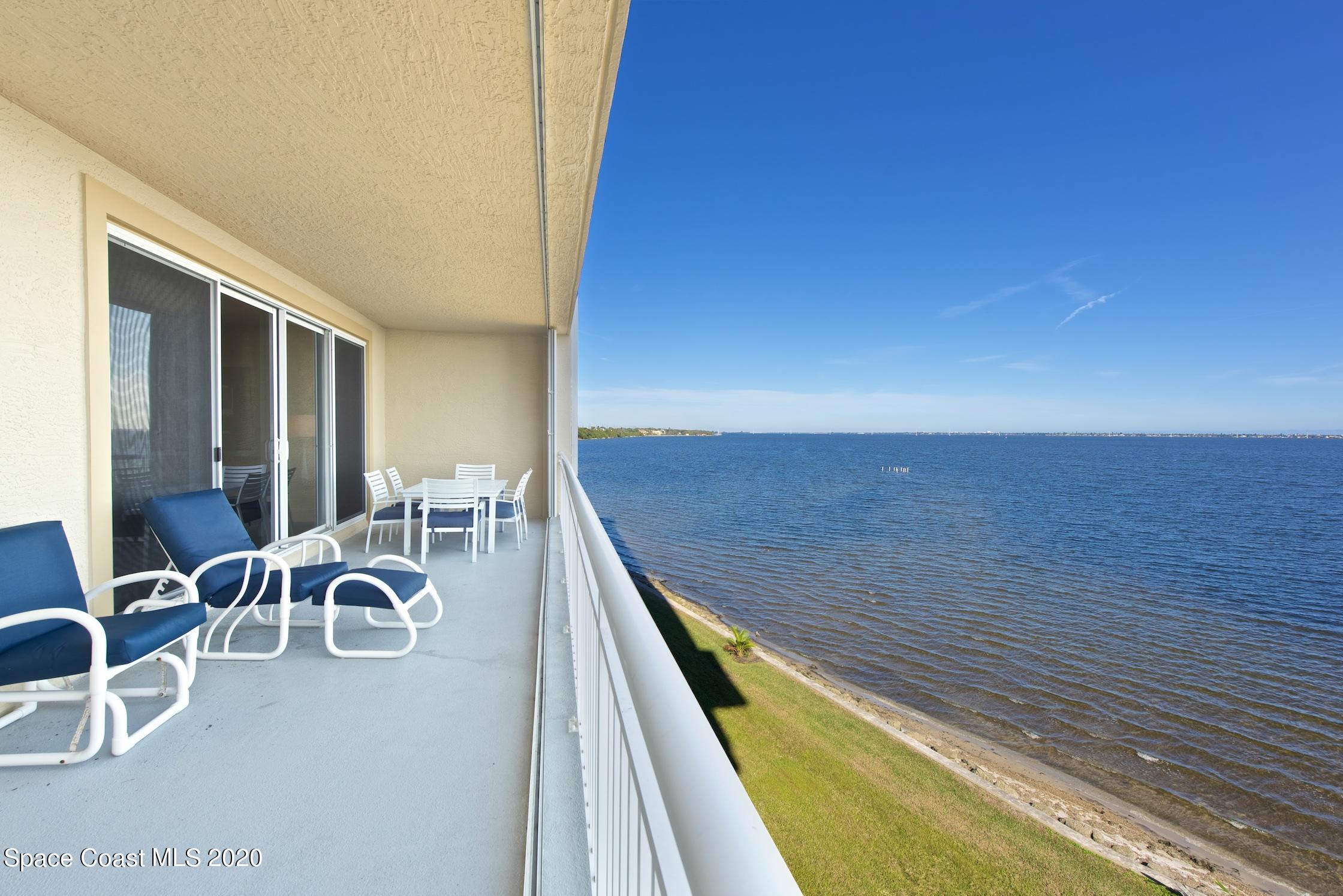 4955 Dixie Highway Northeast, Unit 404 Palm Bay, FL 32905 - Photo 2 of 50 a view of a patio with lawn chairs