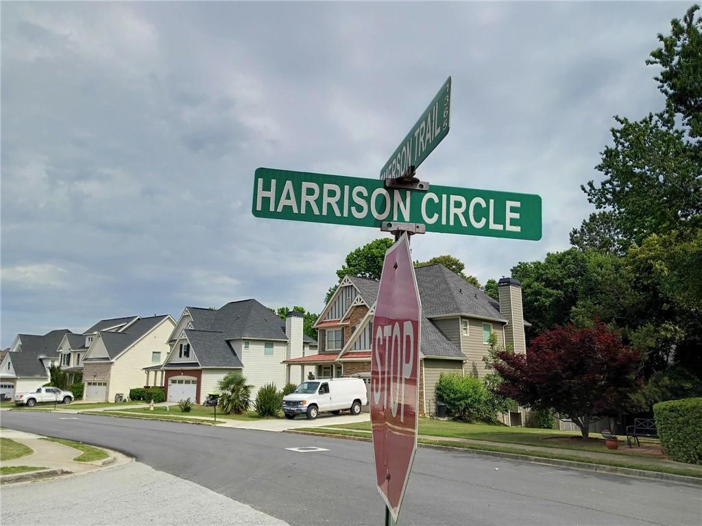 55 Harrison Circle Covington, GA 30016 - Photo 9 of 9 a view of a street with houses