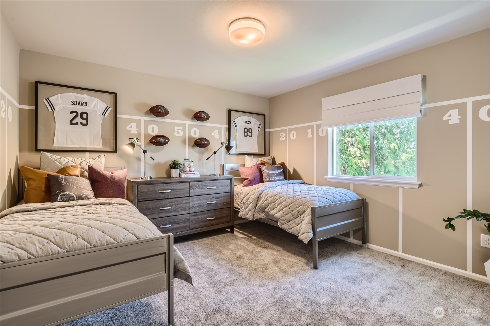 20813 42nd Avenue Southeast, Unit 203 Bothell, WA 98021 - Photo 9 of 24 a bedroom with a bed painting and wall paintings