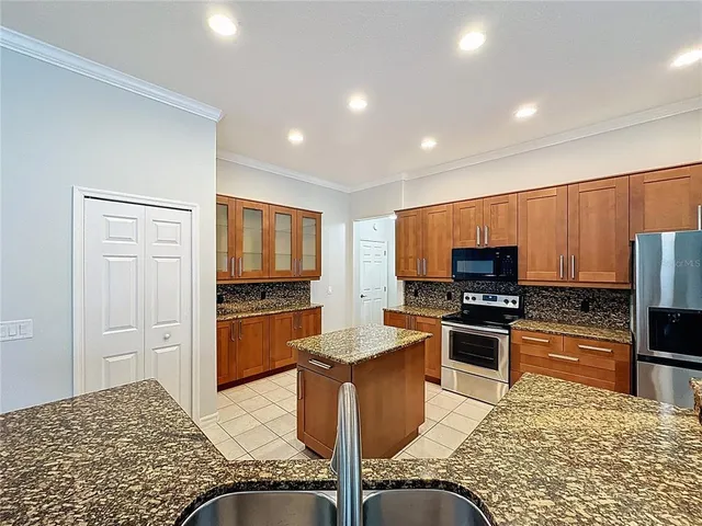 a view of a swimming pool with a yard