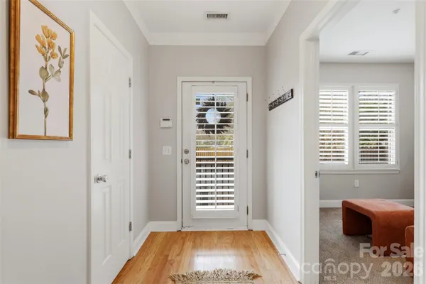 a view of livingroom with hardwood floor and a ceiling fan