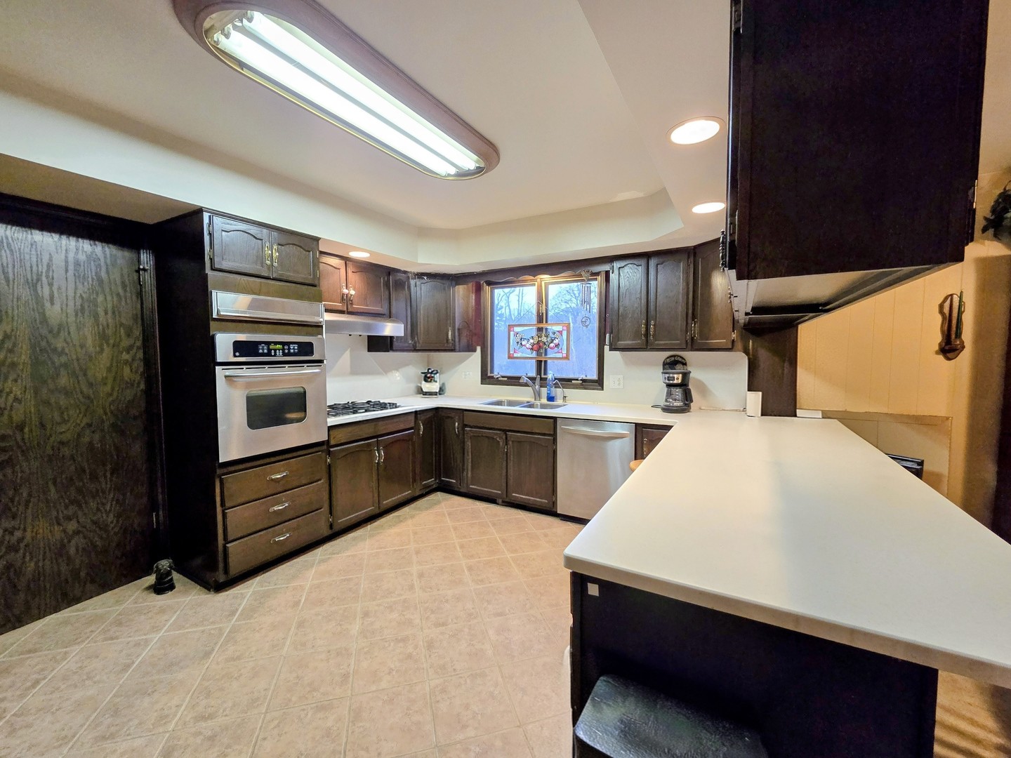 24656 South Willow Brook Trail Crete, IL 60417 - Photo 12 of 39 a kitchen with a refrigerator sink and cabinets