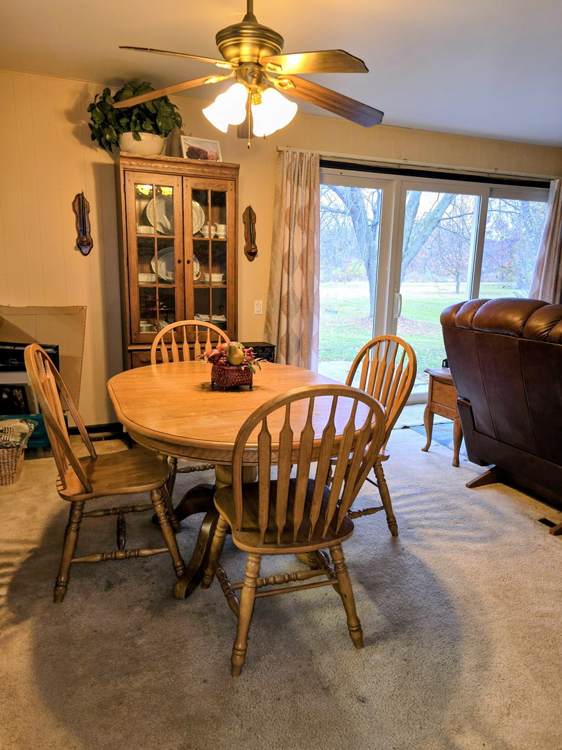 24656 South Willow Brook Trail Crete, IL 60417 - Photo 17 of 39 a view of a dining room with furniture window and outside view