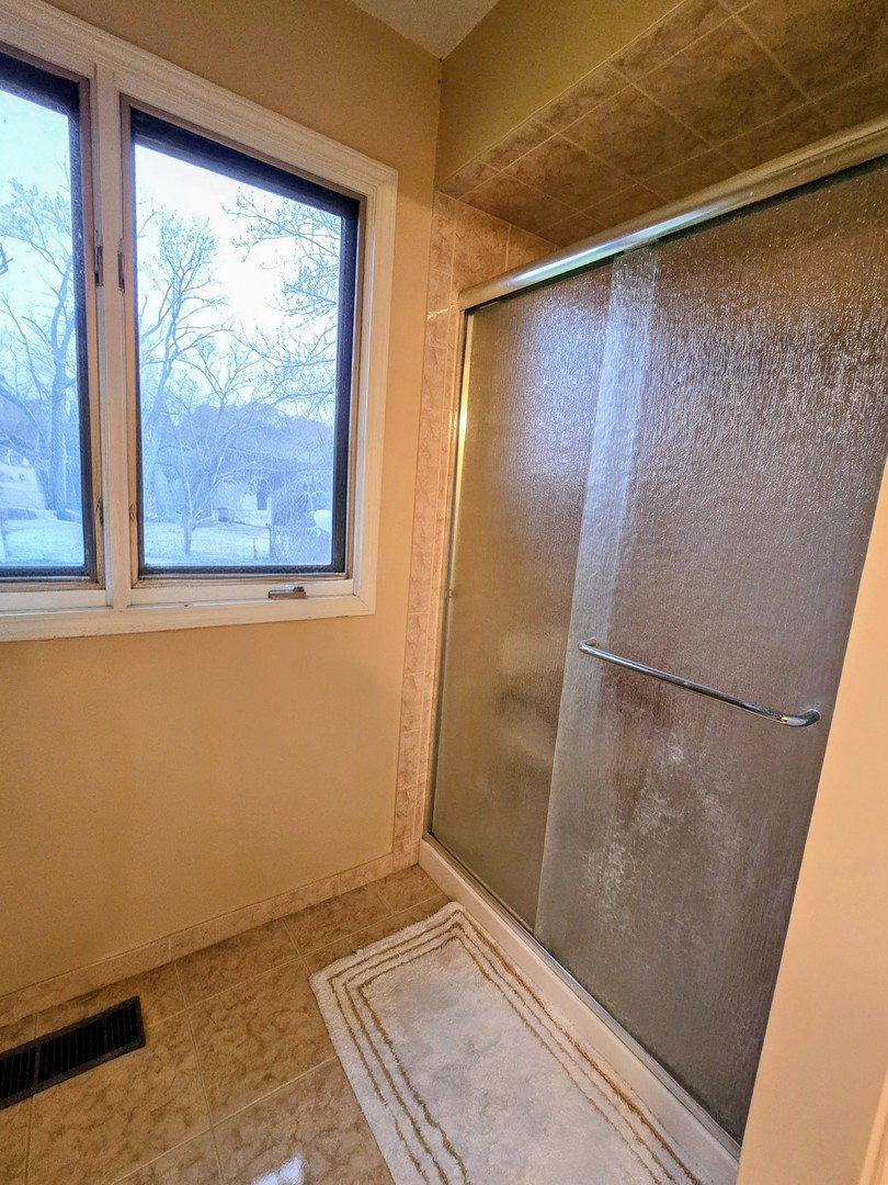 24656 South Willow Brook Trail Crete, IL 60417 - Photo 26 of 39 a view of an empty room with a window