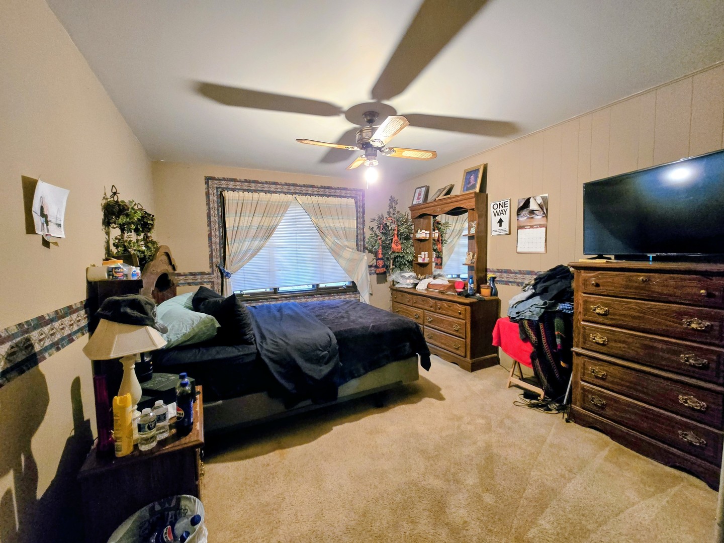 24656 South Willow Brook Trail Crete, IL 60417 - Photo 28 of 39 a bedroom with bed and a flat tv screen on dresser