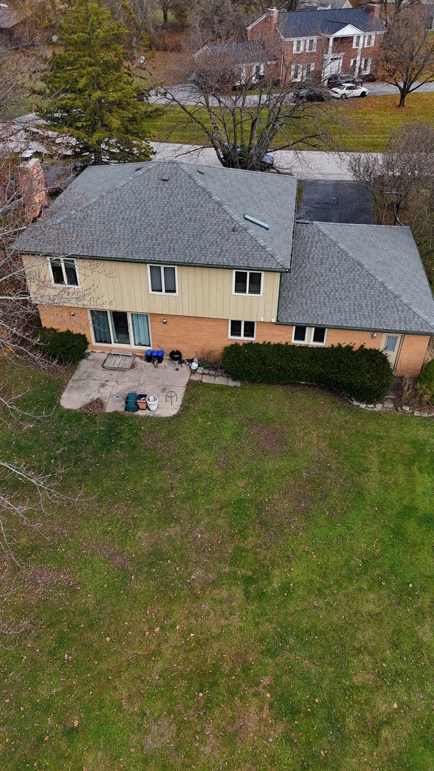 24656 South Willow Brook Trail Crete, IL 60417 - Photo 37 of 39 a aerial view of a house with swimming pool and a yard