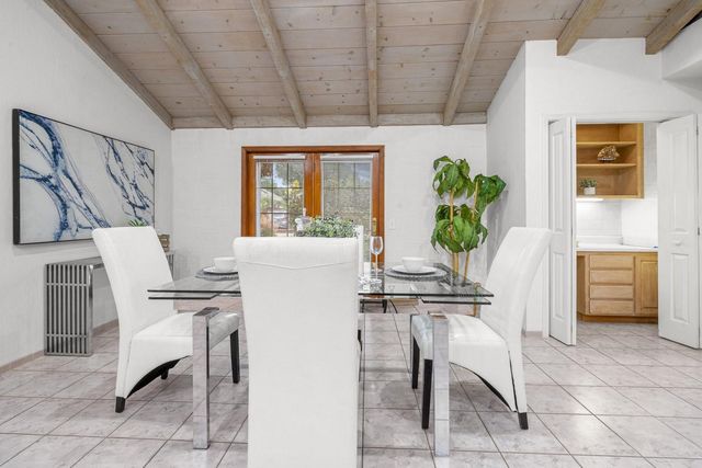 a bed room with a bed and a couch