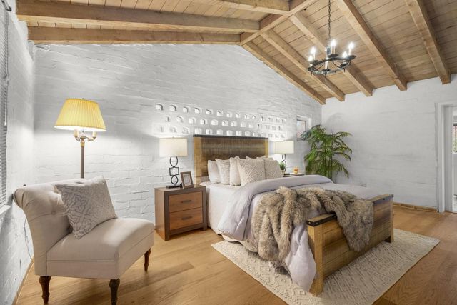 a view of a backyard with sitting area