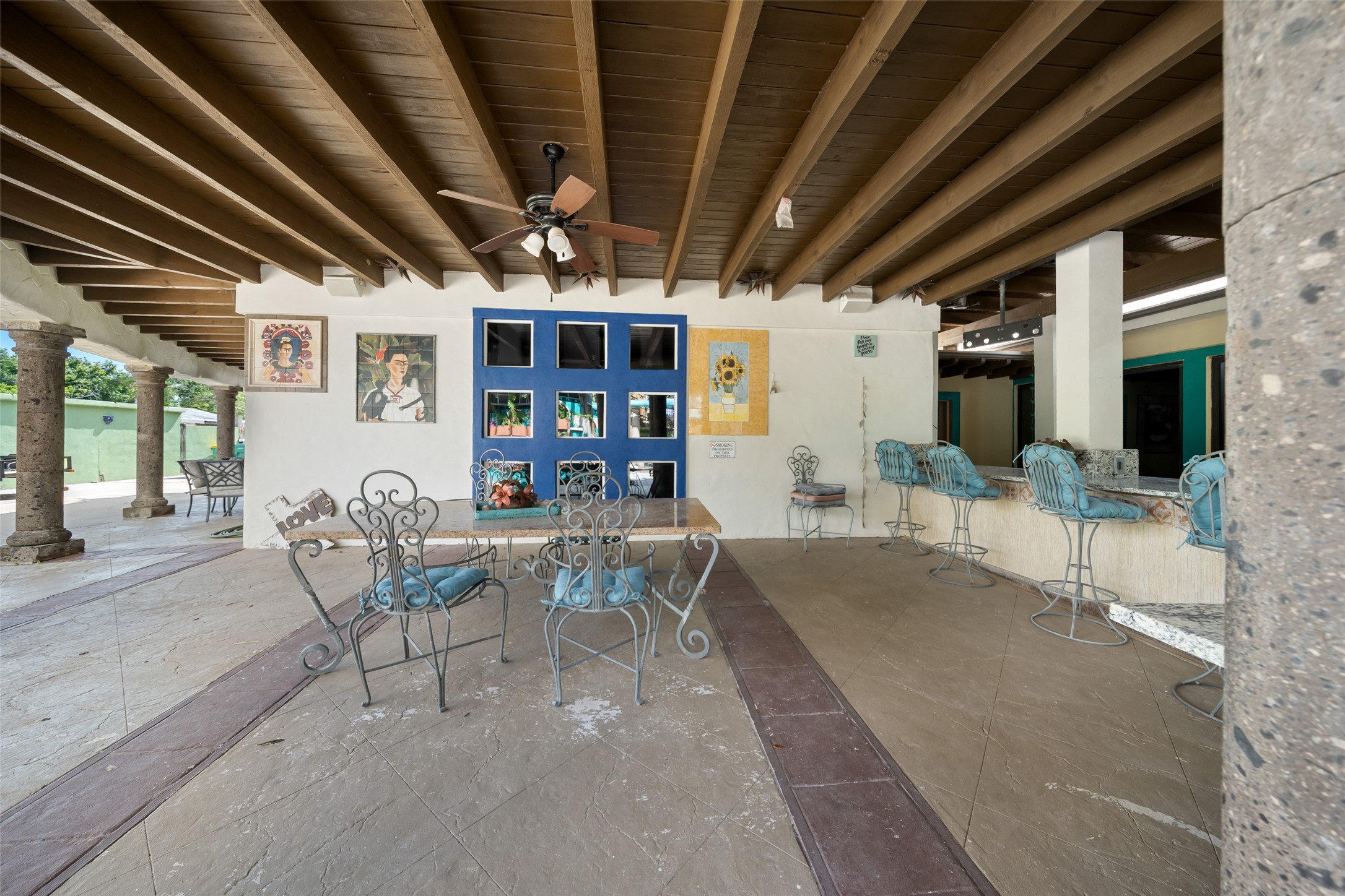 614 Pine Gully Road Seabrook, TX 77586 - Photo 44 of 49 a view of a patio with table and chairs with wooden floor
