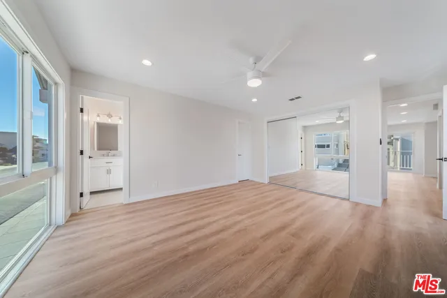 a view of an empty walk in closet
