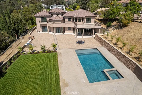 a balcony with yard and green space