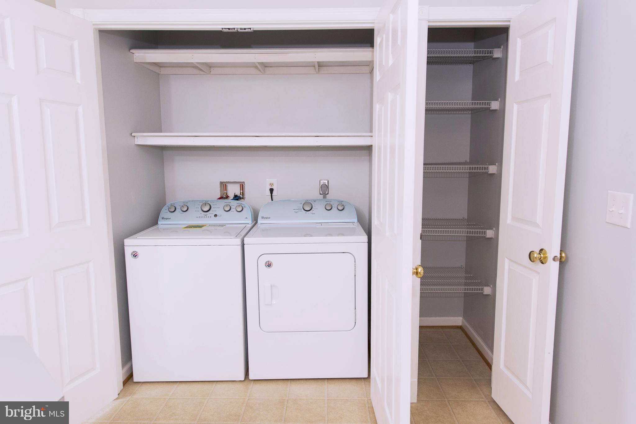 95 Orchard Drive Ranson, WV 25438 - Photo 11 of 22 a utility room with dryer and washer