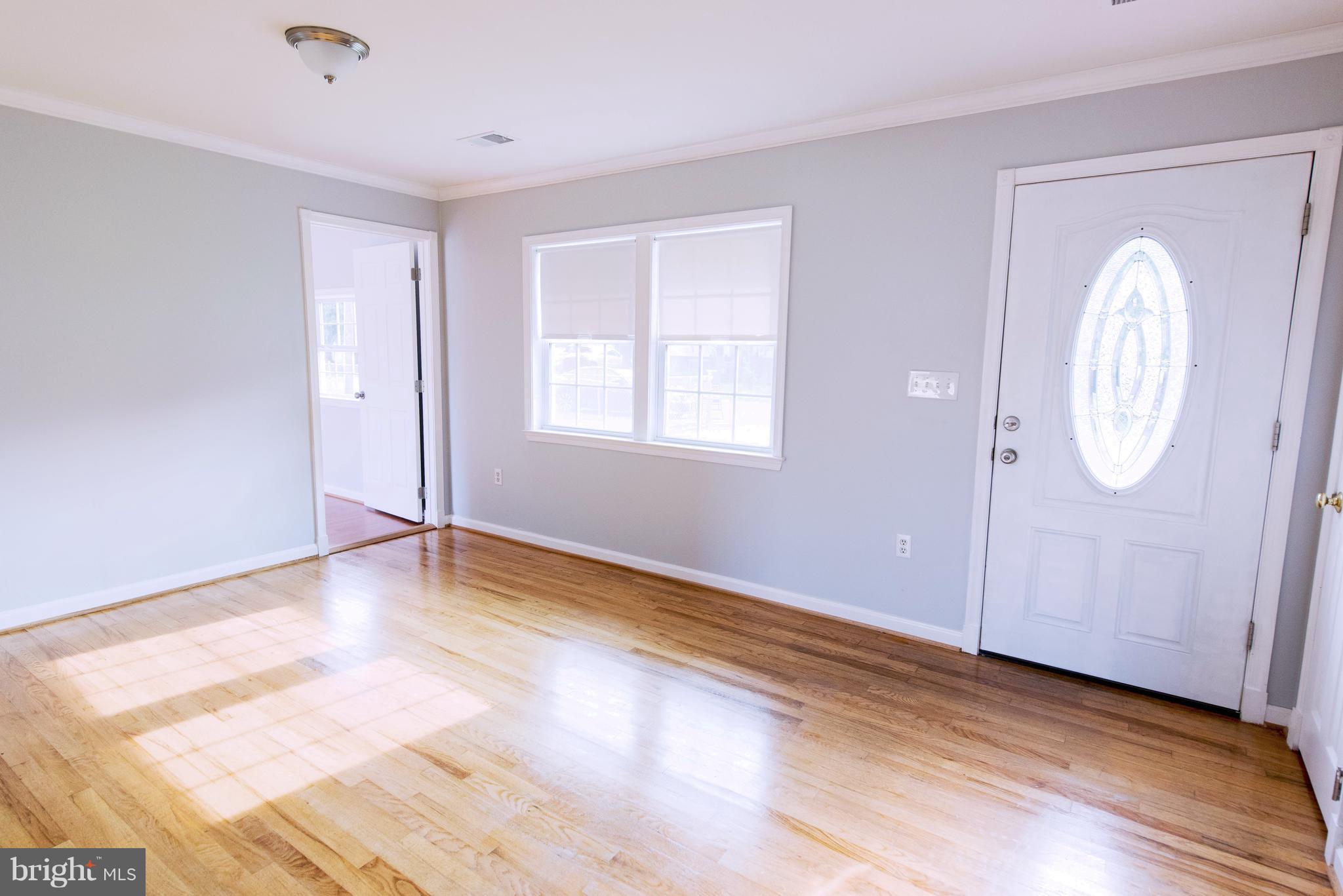 95 Orchard Drive Ranson, WV 25438 - Photo 3 of 22 a view of livingroom with hardwood floor and window