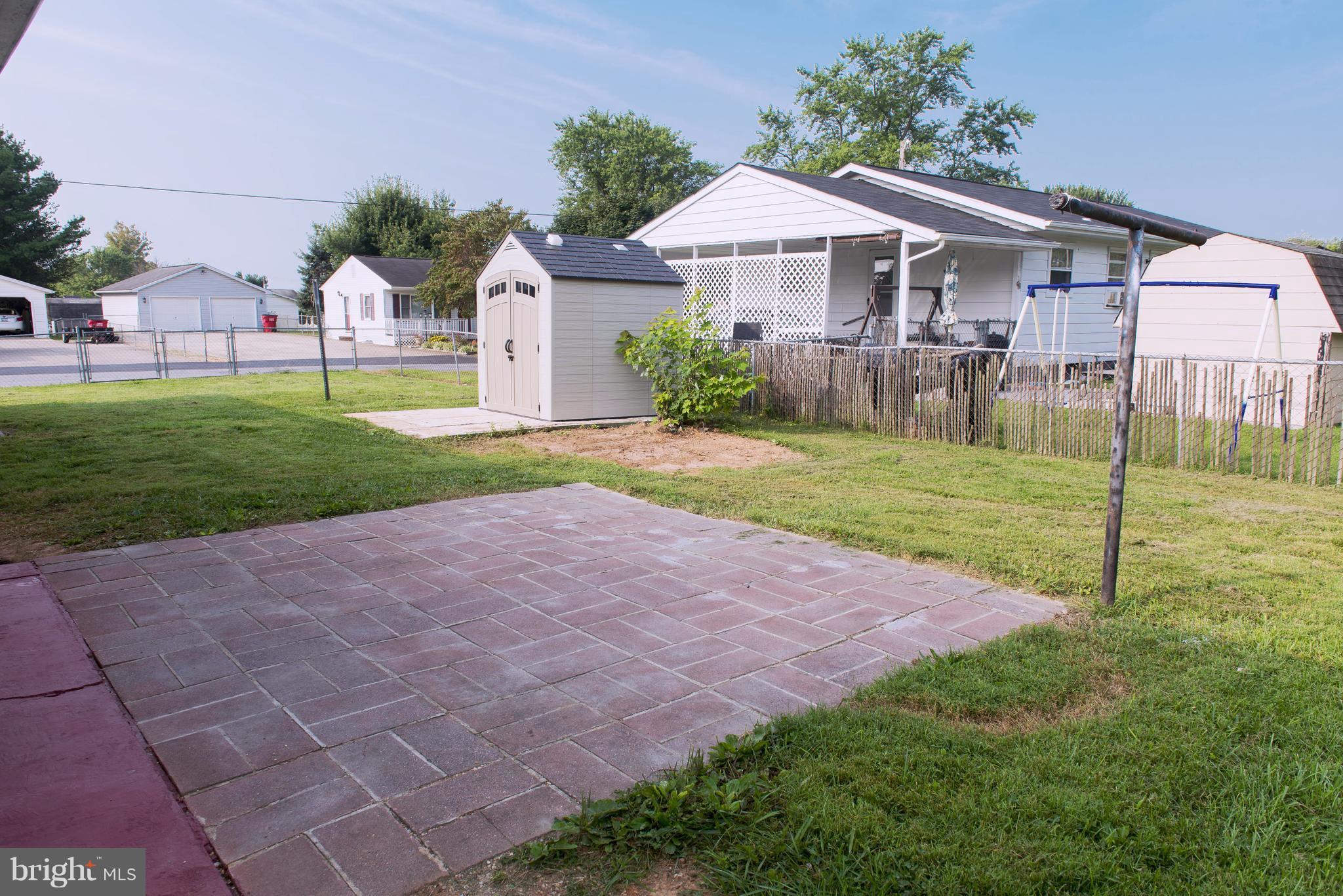 95 Orchard Drive Ranson, WV 25438 - Photo 22 of 22 a view of a house with a yard and a garden