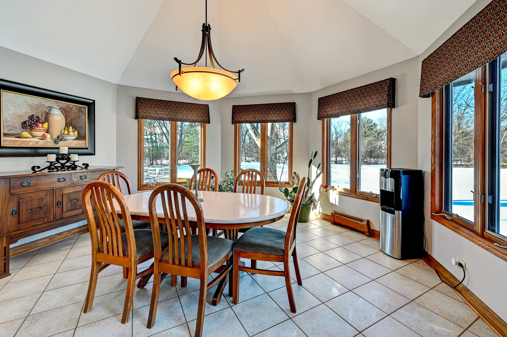 8300 South County Line Road Burr Ridge, IL 60527 - Photo 14 of 37 a view of a dining room with furniture large windows and wooden floor