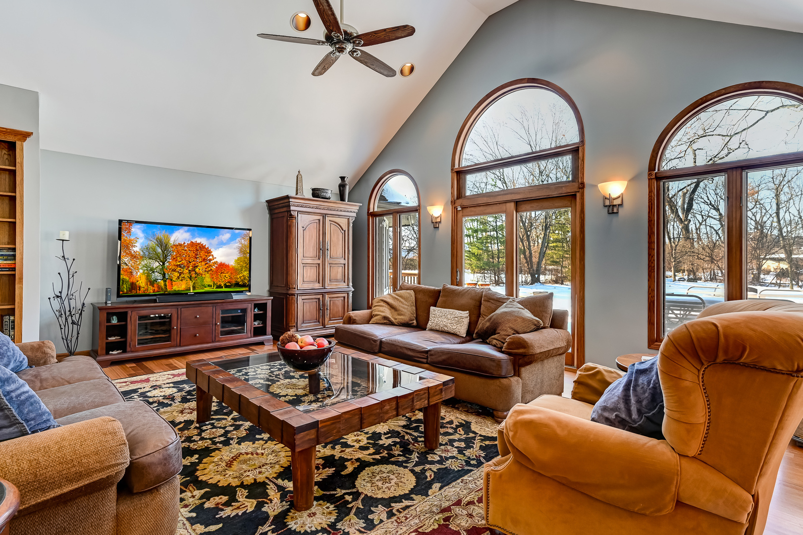8300 South County Line Road Burr Ridge, IL 60527 - Photo 16 of 37 a living room with furniture a rug and a large window