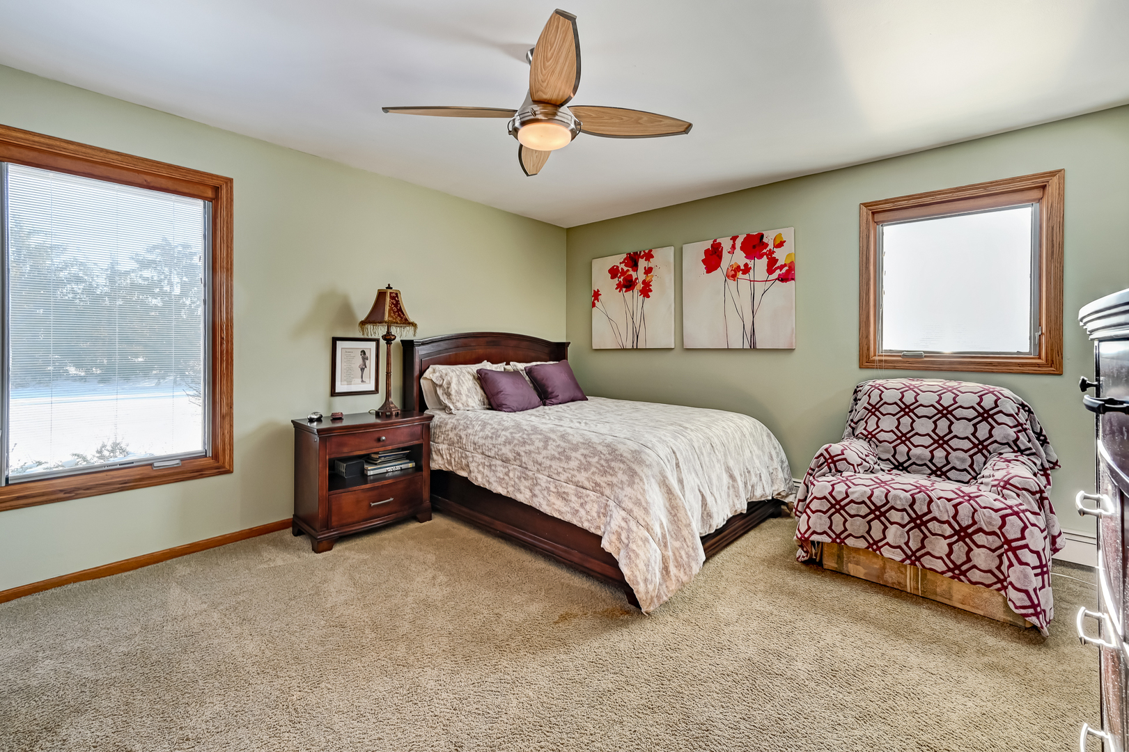 8300 South County Line Road Burr Ridge, IL 60527 - Photo 18 of 37 a bedroom with a bed dresser and a window