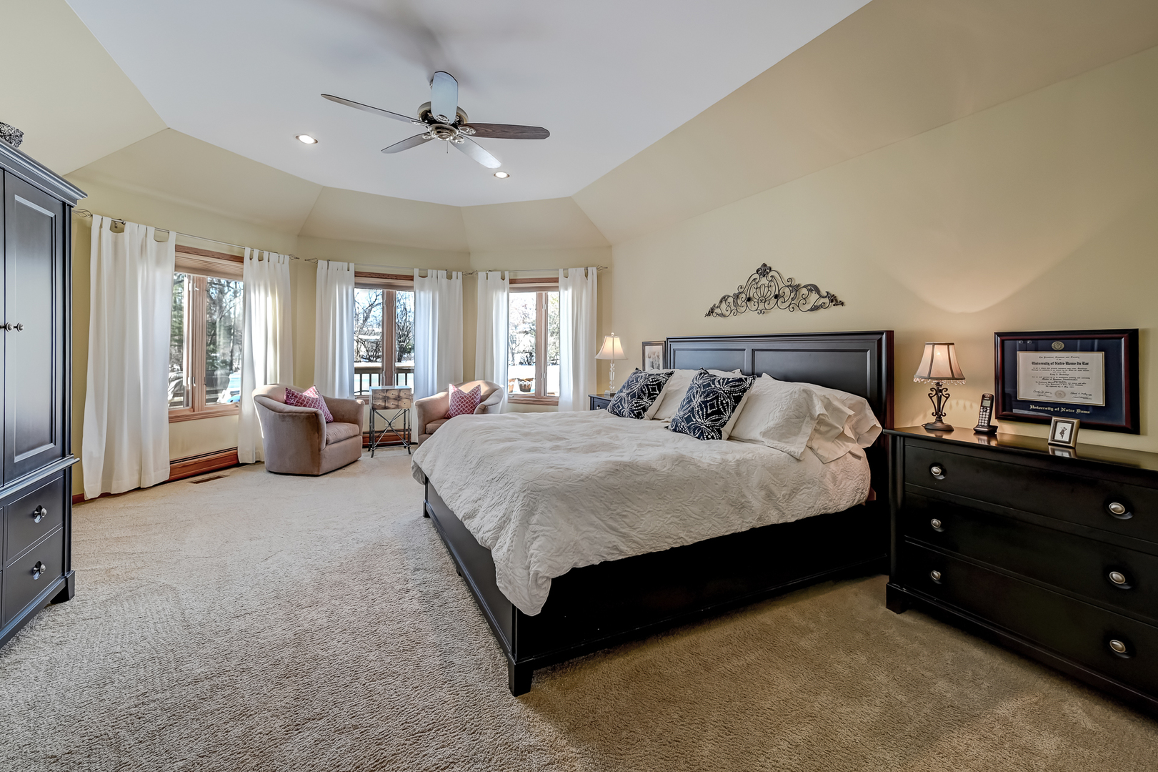 8300 South County Line Road Burr Ridge, IL 60527 - Photo 22 of 37 a spacious bedroom with a bed and window