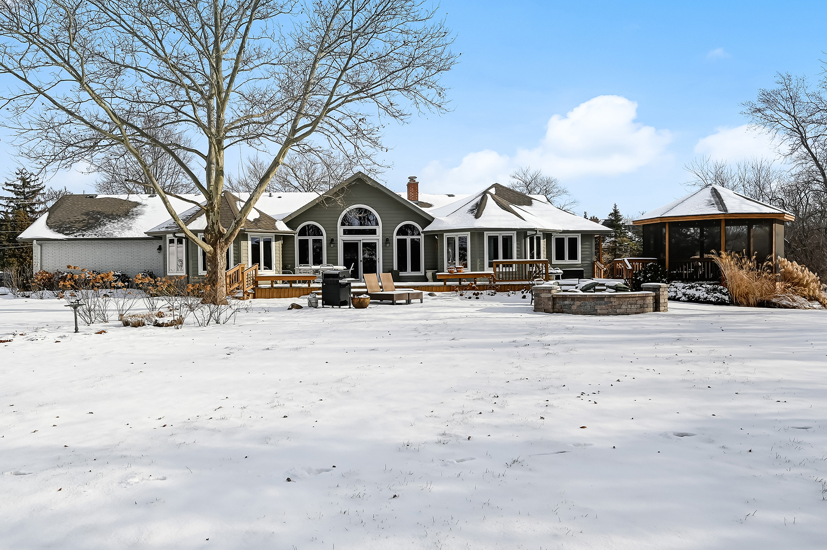 8300 South County Line Road Burr Ridge, IL 60527 - Photo 29 of 37 a front view of a house with large trees