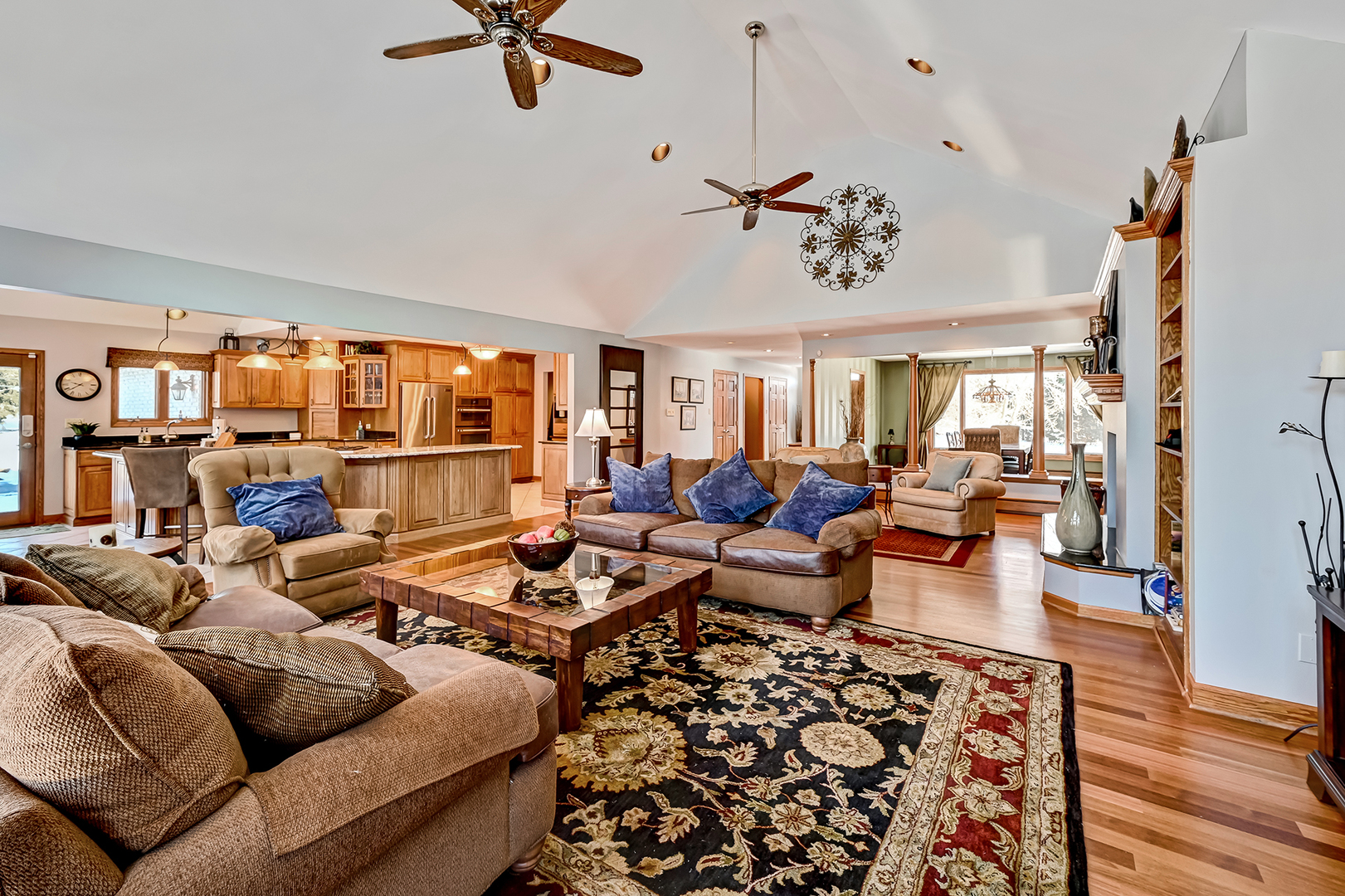 8300 South County Line Road Burr Ridge, IL 60527 - Photo 9 of 37 a living room with lots of furniture and a rug